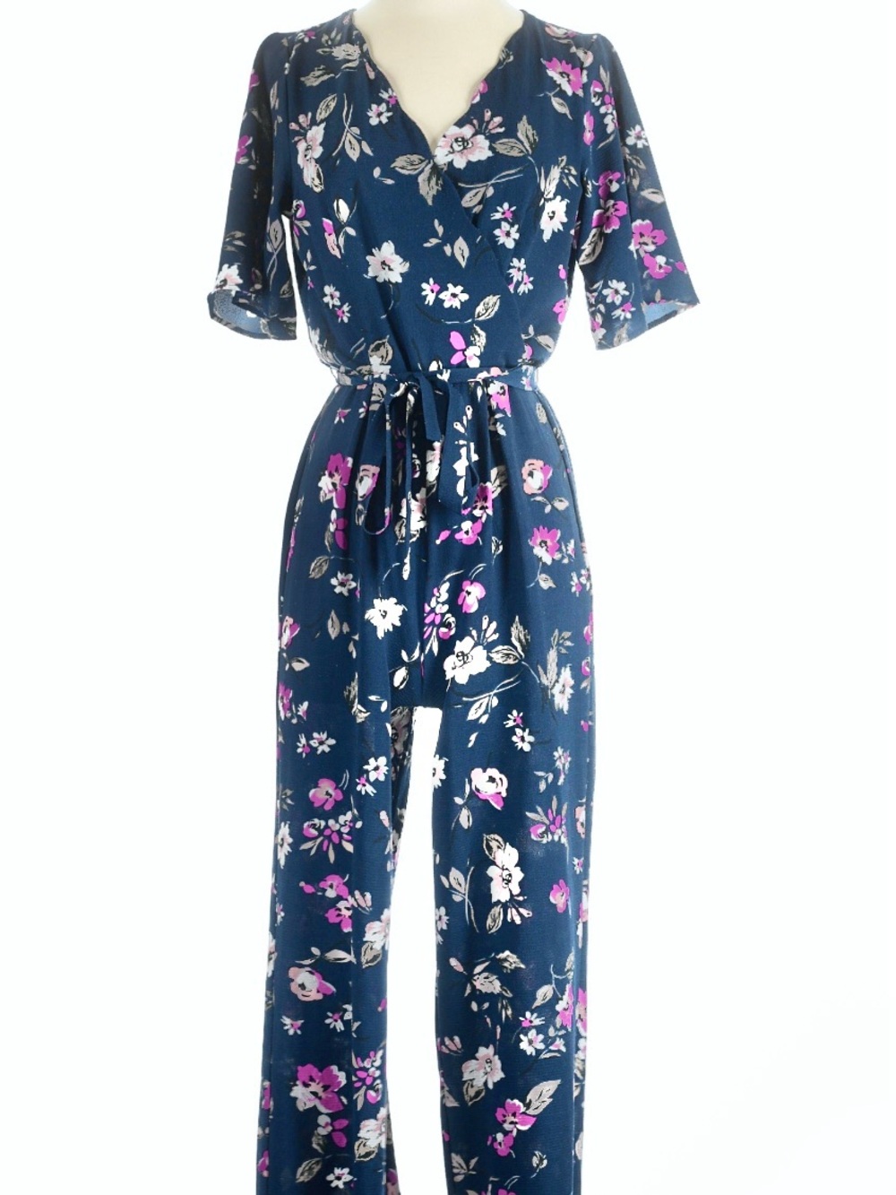 Row A navy floral jumpsuit with tie waist